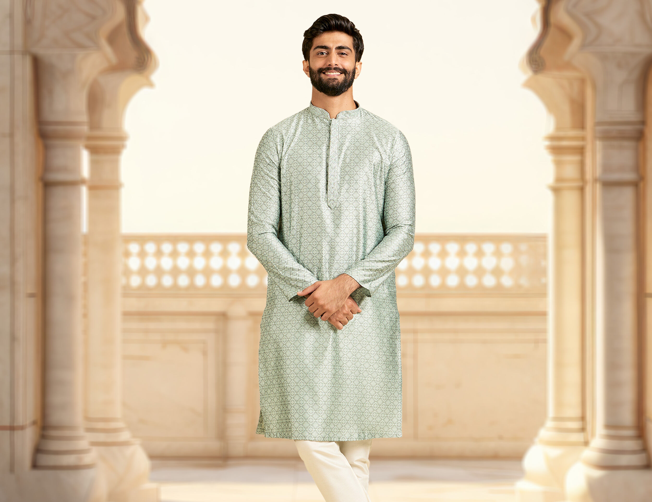 Men in grey kurta pajama with pattern on it for upcoming wedding